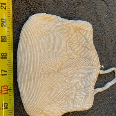Vintage well made beaded handbag and satin interior