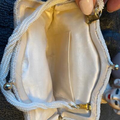 Vintage well made beaded handbag and satin interior