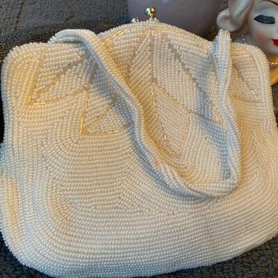 Vintage well made beaded handbag and satin interior
