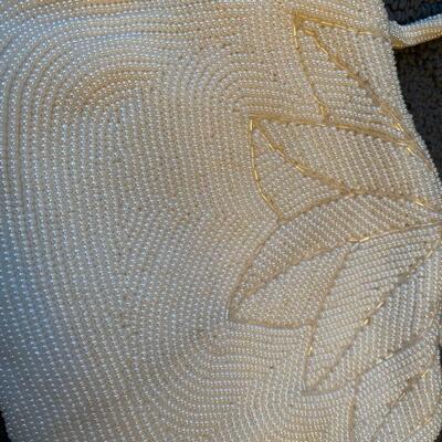 Vintage well made beaded handbag and satin interior