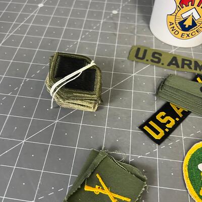 US Army with patches and coffee cup 