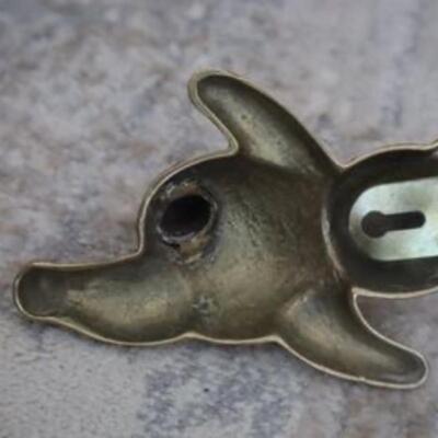 Vintage solid brass bear wall hanging