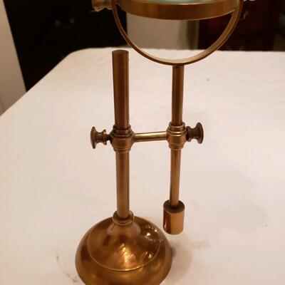 Vintage Magnifying glass on brass stand