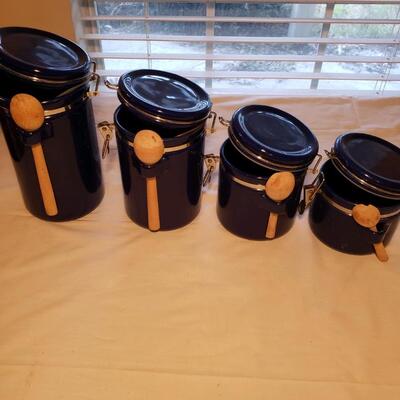Set of locking cobalt ceramic canisters with wooden spoons