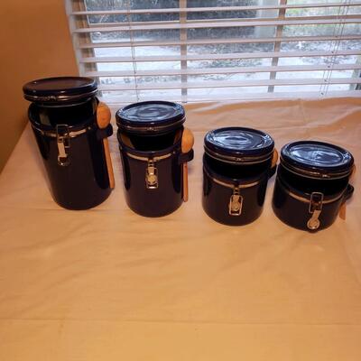 Set of locking cobalt ceramic canisters with wooden spoons