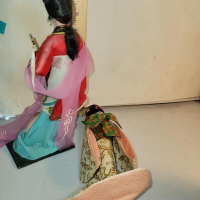 2 cloth oriental figurines