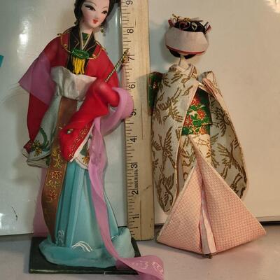 2 cloth oriental figurines