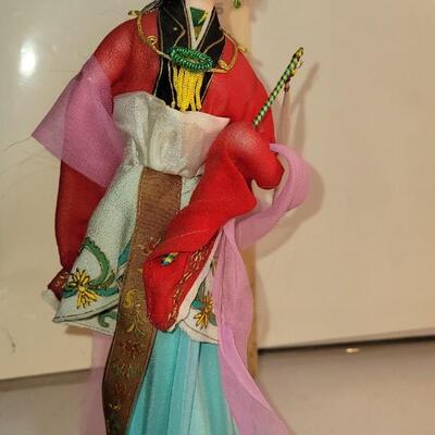 2 cloth oriental figurines
