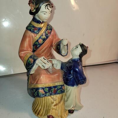 Porcelain/ceramic Asian figurine