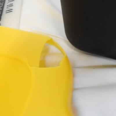 4 Durabilt 10 Gallon Tubs.  Black with Yellow Lids (Lids damaged, see pics)