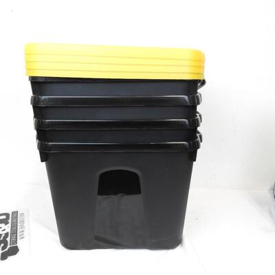 4 Durabilt 10 Gallon Tubs.  Black with Yellow Lids (Lids damaged, see pics)