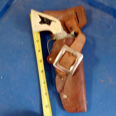 LOT 164  OLD CAP GUN AND NEAT LEATHER HOLSTER