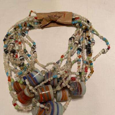 Lot A of one dozen vintage glass Mardi Gras beads