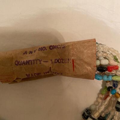 Lot A of one dozen vintage glass Mardi Gras beads