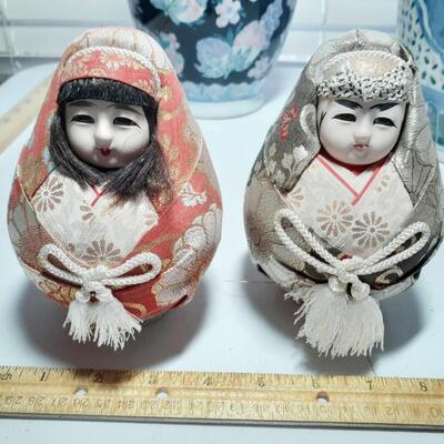 2 oriental women dolls