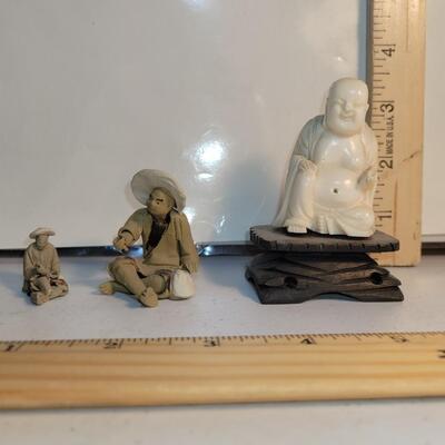 3 small Asian figures