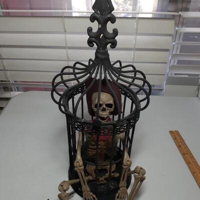 16in tall pirate skeleton in cage