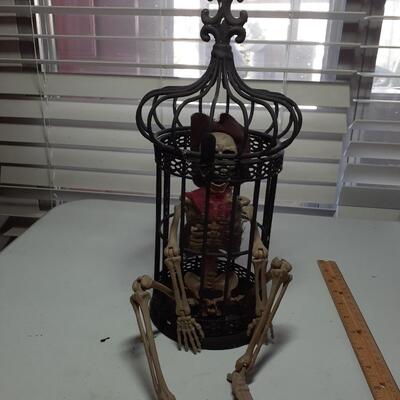 16in tall pirate skeleton in cage