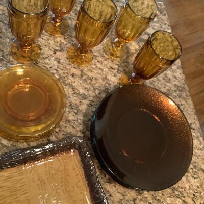 Amber stemmed glassware, glass tray