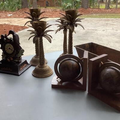 Brass palm candlesticks, bookends, clock decor