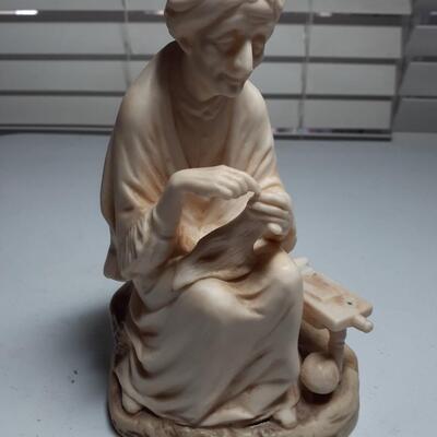 Porcelan 7in tall Old woman sewing
