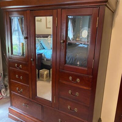 Lovely all-wood wardrobe with mirror and glass upper doors.