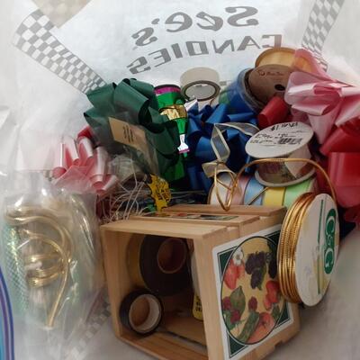 Bag of ribbons bows and candles