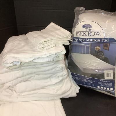 Lot 958. Lot of Queen Size Duvet Cover, Bedskirt, Flannel Sheet Set, Cotton Sheet Set, & NEW IN PKG Mattress Pad