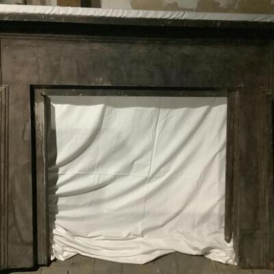 Mantel surround- brown stained wood