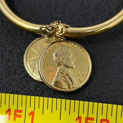 GOLD-TONED BANGLE BRACELET W/ PENNY CHARMS