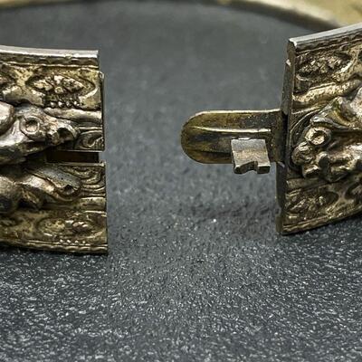 VINTAGE SILVER-TONED HINGED CUFF BRACELET W/ FLORAL DESIGN