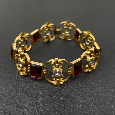 VINTAGE SIMMONS GOLD-TONE & RED JEWELED BRACELET