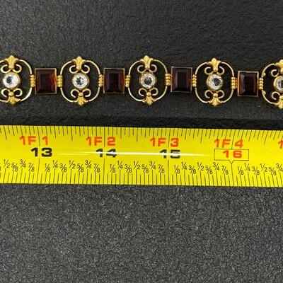 VINTAGE SIMMONS GOLD-TONE & RED JEWELED BRACELET