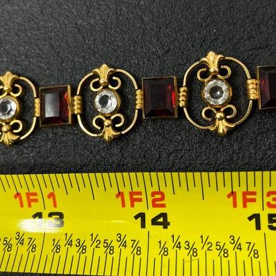 VINTAGE SIMMONS GOLD-TONE & RED JEWELED BRACELET