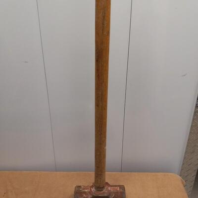 LOT 16  SLEDGEHAMMER, PICKAXE AND POST POUNDER
