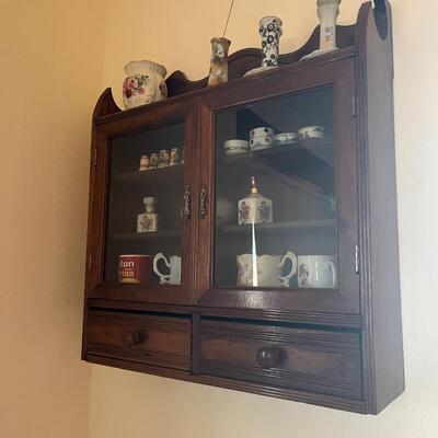 Hanging glass front cabinet with 2 drawers (with contents)