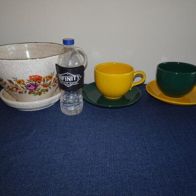 LOT 407. DECORATIVE OVERSIZED MUG AND TWO MUGS