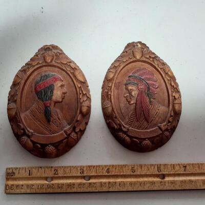 2 vintage 5in tall Indian wooden pictures
