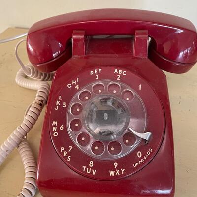 ST vintage red rotary dial phone