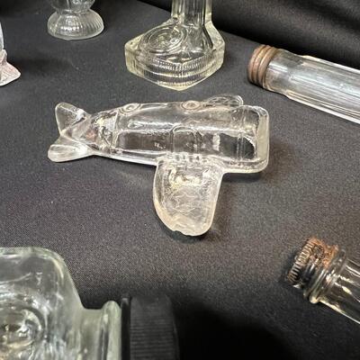 Lot of 16 Antique Glass Candy Jars Shaped Like Cars, Tank, Planes, Boats, Train, Guns, Telephone, and Lanterns