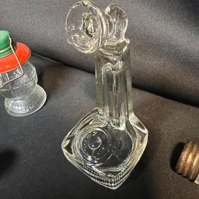 Lot of 16 Antique Glass Candy Jars Shaped Like Cars, Tank, Planes, Boats, Train, Guns, Telephone, and Lanterns