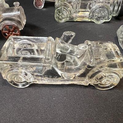 Lot of 16 Antique Glass Candy Jars Shaped Like Cars, Tank, Planes, Boats, Train, Guns, Telephone, and Lanterns