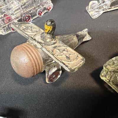 Lot of 16 Antique Glass Candy Jars Shaped Like Cars, Tank, Planes, Boats, Train, Guns, Telephone, and Lanterns