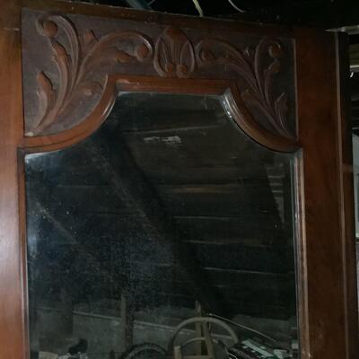 Antique wardrobe with beveled mirrors