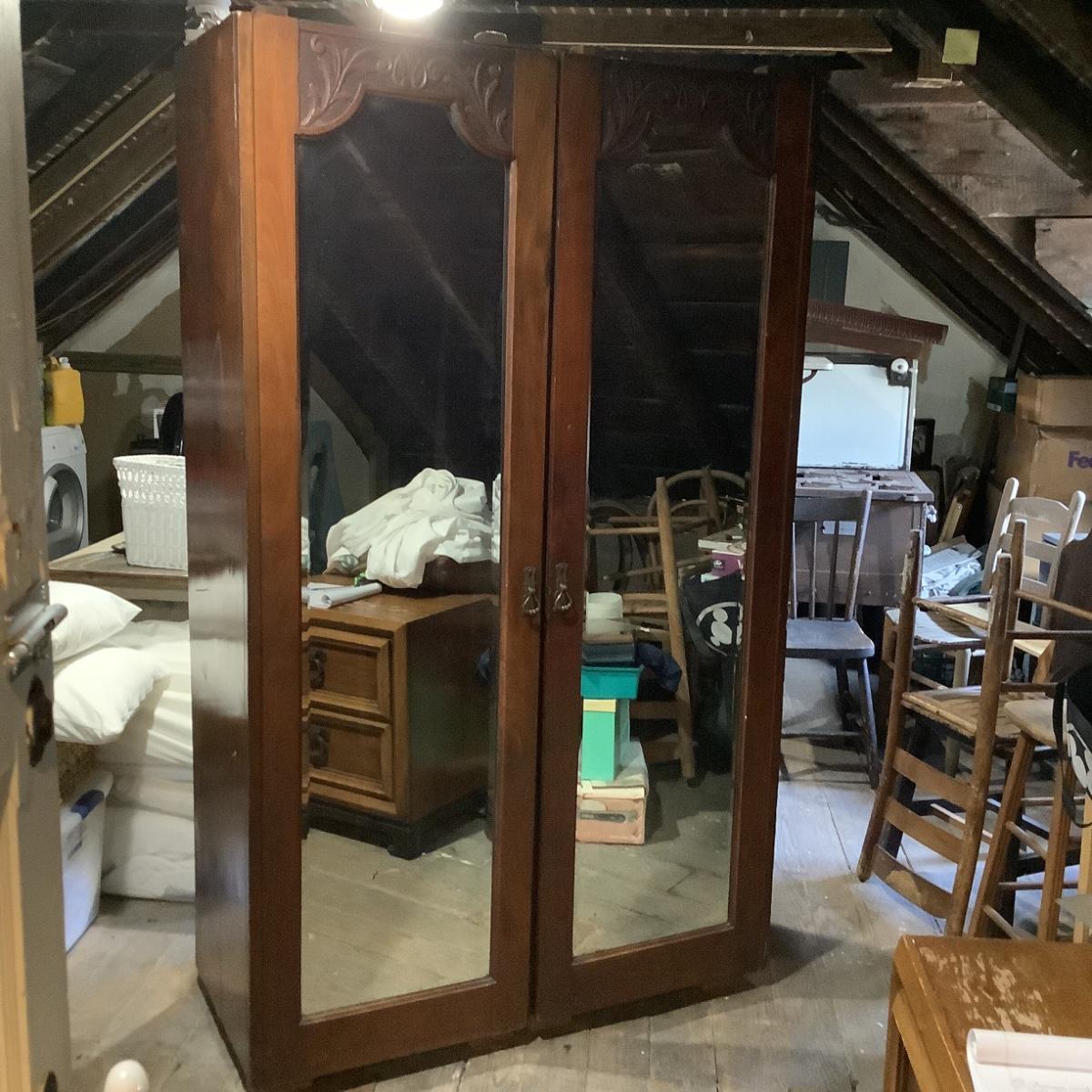 Antique wardrobe with beveled mirrors