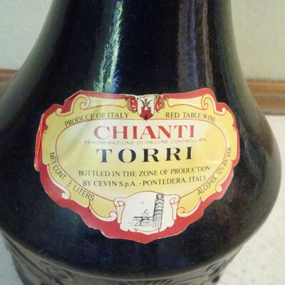 LOT 452.   44" TALL DECORATIVE WINE BOTTLE