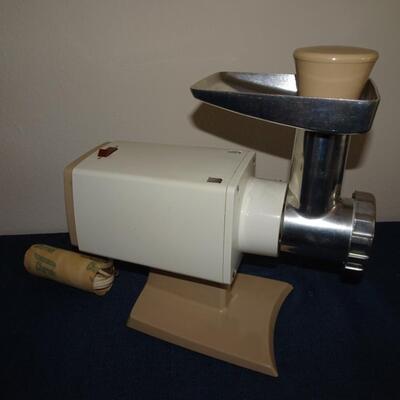 LOT 470.  OSTER FOOD GRINDER