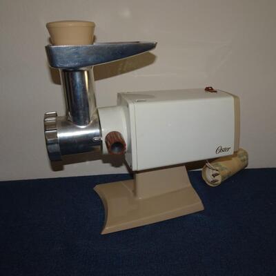 LOT 470.  OSTER FOOD GRINDER