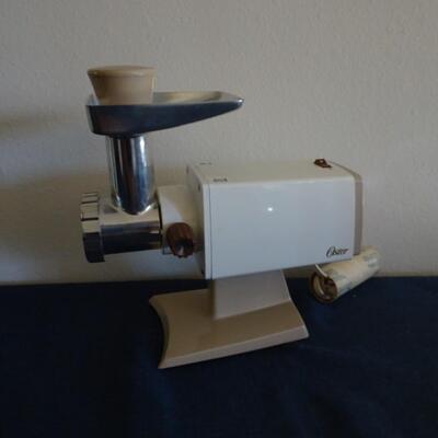 LOT 470.  OSTER FOOD GRINDER