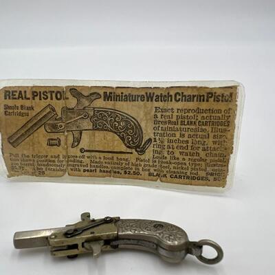 Antique Miniature Watch Charm Pistol Toy Gun Made in Austria with Original Paper Description